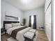 Primary bedroom with king-size bed and double closets at 1109 5Th Sw St, Winter Haven, FL 33880