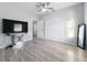 Spacious bedroom with large closet and wood-look floors at 1109 5Th Sw St, Winter Haven, FL 33880