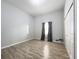 Spacious bedroom with wood-look floors and double closets at 1109 5Th Sw St, Winter Haven, FL 33880