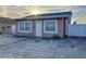 Cute single story home with a pink exterior and white accents at 1109 5Th Sw St, Winter Haven, FL 33880
