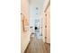 Bathroom hallway with a shower and double vanity with modern fixtures at 15079 Willow Arbor Cir, Orlando, FL 32824