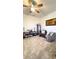 Cozy sitting room area featuring neutral tones, ample natural light, and comfortable furnishings at 15079 Willow Arbor Cir, Orlando, FL 32824