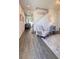 Inviting entryway with wood-look tile flooring, a neutral color palette, and bright natural light at 15079 Willow Arbor Cir, Orlando, FL 32824