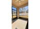 Screened-in outdoor patio overlooking a fenced backyard and mature trees at 15079 Willow Arbor Cir, Orlando, FL 32824