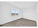 Bright bedroom with carpet flooring and large window at 16567 Parable Way, Winter Garden, FL 34787