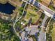 Aerial view of community park with parking and walking paths at 17863 Passionflower Cir, Clermont, FL 34714