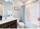 Clean bathroom featuring a shower/tub combo and updated vanity at 17863 Passionflower Cir, Clermont, FL 34714