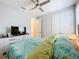 Comfortable bedroom with double bed and en-suite bathroom at 17863 Passionflower Cir, Clermont, FL 34714