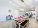 Modern dining room adjacent to kitchen at 17863 Passionflower Cir, Clermont, FL 34714