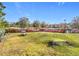Dog park with agility features and benches for pet owners at 17863 Passionflower Cir, Clermont, FL 34714
