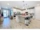 Open concept kitchen with island and breakfast bar at 17863 Passionflower Cir, Clermont, FL 34714