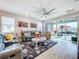 Comfortable living room with sliding doors to lanai at 17863 Passionflower Cir, Clermont, FL 34714