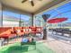 Cozy screened patio with seating and outdoor dining at 17863 Passionflower Cir, Clermont, FL 34714