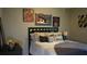 Stylish bedroom with a bed and basketball-themed art at 180 Daigledog St, St Cloud, FL 34772