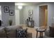 Bright and airy entryway with a console table and decor at 180 Daigledog St, St Cloud, FL 34772