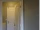 Clean hallway with doors to other rooms at 180 Daigledog St, St Cloud, FL 34772
