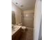 Tiled bathroom featuring a single sink vanity and a walk-in shower at 1919 Bentley Blvd, Kissimmee, FL 34741