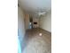 Open-concept living room featuring tiled floors and lots of natural light at 1919 Bentley Blvd, Kissimmee, FL 34741