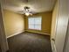 Bright bedroom with carpet flooring and ceiling fan at 2007 Dixie Belle Dr # 2007 I, Orlando, FL 32812