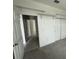 Hallway with additional closets and access to bedrooms at 231 Tarpon Bay Blvd, Haines City, FL 33844