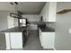 Modern kitchen featuring granite countertops and stainless steel appliances at 231 Tarpon Bay Blvd, Haines City, FL 33844