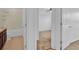 Hall bathroom with a tub, single vanity with dark wood cabinets, and tile flooring at 2617 Amati Dr, Kissimmee, FL 34741