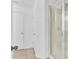 Bathroom featuring a glass enclosed shower, tile flooring and neutral walls at 2617 Amati Dr, Kissimmee, FL 34741