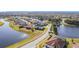 Aerial view of a luxury waterfront community with upscale homes at 2821 Rialto Ct, Kissimmee, FL 34746