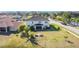 Aerial view showcasing home's backyard and neighborhood at 2821 Rialto Ct, Kissimmee, FL 34746