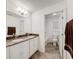 Bathroom with double vanity and shower/tub combo at 2821 Rialto Ct, Kissimmee, FL 34746