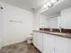 Bathroom with double vanity, granite countertop, and tile flooring at 2821 Rialto Ct, Kissimmee, FL 34746