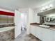 Elegant bathroom with a double vanity and separate toilet area at 2821 Rialto Ct, Kissimmee, FL 34746