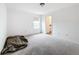 Spacious bedroom with carpet flooring and a large window at 2821 Rialto Ct, Kissimmee, FL 34746