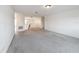 Spacious bedroom with neutral carpeting and large window at 2821 Rialto Ct, Kissimmee, FL 34746