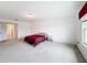 Well-lit bedroom with carpet and a window at 2821 Rialto Ct, Kissimmee, FL 34746