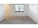 Simply styled bedroom with carpet, window, and closet at 2821 Rialto Ct, Kissimmee, FL 34746
