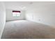 Spacious bedroom with neutral carpeting and large window at 2821 Rialto Ct, Kissimmee, FL 34746