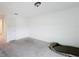 Empty bedroom with grey carpet and neutral walls at 2821 Rialto Ct, Kissimmee, FL 34746