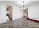 Spacious dining room with tile floors and access to kitchen and stairs at 2821 Rialto Ct, Kissimmee, FL 34746
