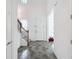 Bright entryway with tile flooring and staircase at 2821 Rialto Ct, Kissimmee, FL 34746