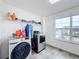 Laundry room featuring a washer, dryer, and storage at 2821 Rialto Ct, Kissimmee, FL 34746