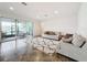 Bright and airy living room with sliding glass doors leading to a patio at 2821 Rialto Ct, Kissimmee, FL 34746