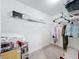 Spacious walk-in closet with wire shelving and hanging rods at 2821 Rialto Ct, Kissimmee, FL 34746