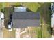 House with gray roof, driveway, and yard at 2959 Old Dixie Hwy, Kissimmee, FL 34744