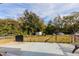 Spacious backyard with wooden deck and mature trees at 2959 Old Dixie Hwy, Kissimmee, FL 34744