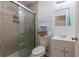 Bathroom with shower, toilet, and small vanity at 2959 Old Dixie Hwy, Kissimmee, FL 34744