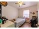 Bedroom with double bed and ceiling fan at 2959 Old Dixie Hwy, Kissimmee, FL 34744