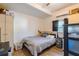 Cozy bedroom with a double bed and wood floor at 2959 Old Dixie Hwy, Kissimmee, FL 34744