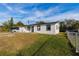Newly renovated home with a white exterior and black accents at 2959 Old Dixie Hwy, Kissimmee, FL 34744