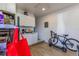 Small galley kitchen with white cabinets and appliances at 2959 Old Dixie Hwy, Kissimmee, FL 34744